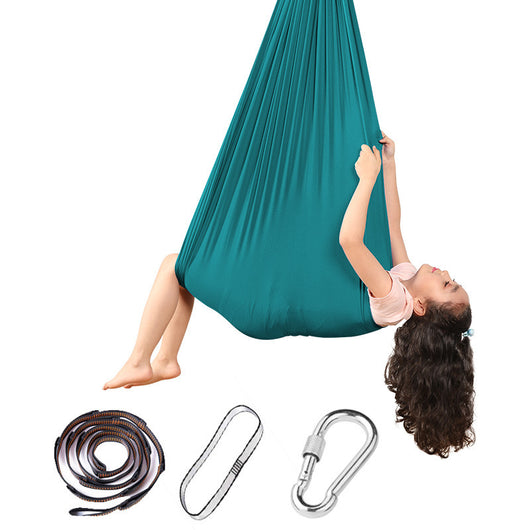 Teal aerial yoga swing with accessories on a white background