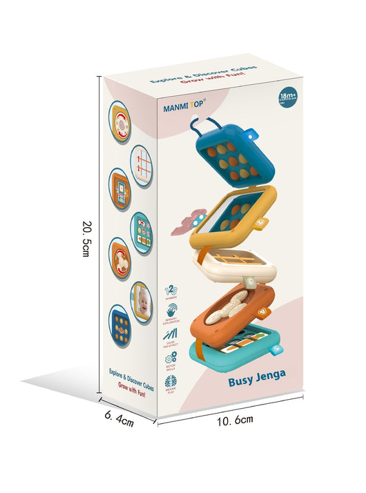 A child sitting in a high chair playing with a colorful Jenga-like puzzle toy made of plastic.