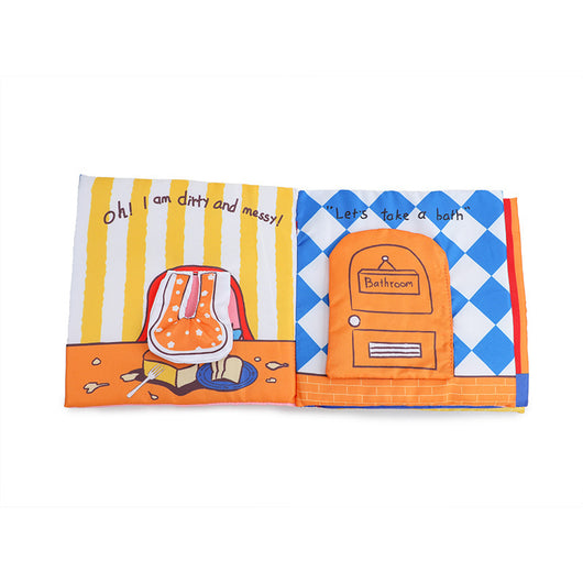 Children's fabric book with colorful illustrations on a white background