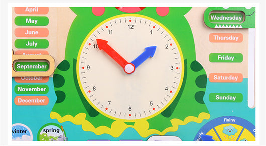 Children's educational clock with colorful design and month labels.