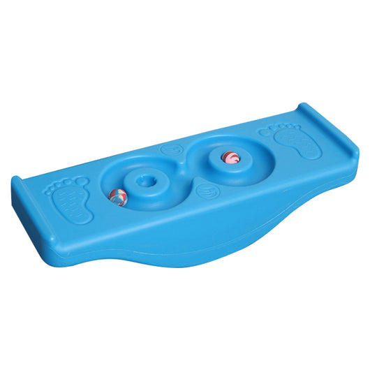 A bright yellow children's balance platform rock and roll seesaw toy with a few holes and small items placed on it.