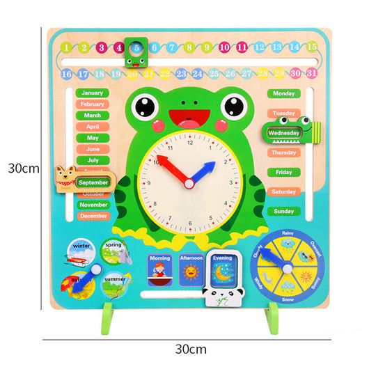 Educational children's board with a frog design, clock, calendar, and weather wheel, measuring 30cm x 30cm.