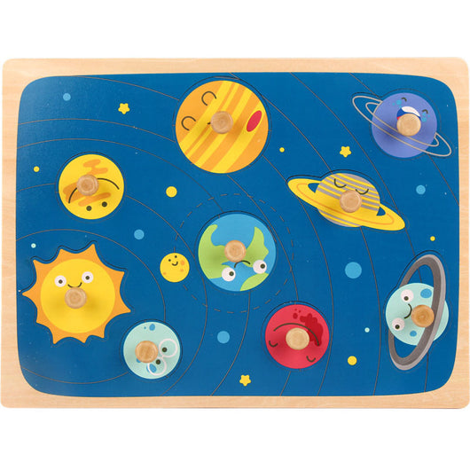 Wooden puzzle with colorful solar system design on a blue background