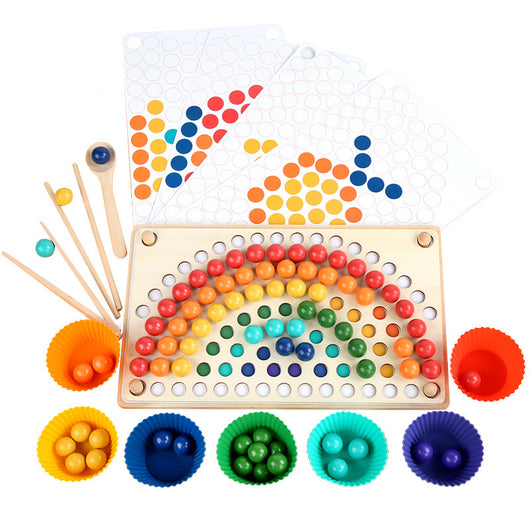 Colorful dot game with wooden board and colorful beads on a white background