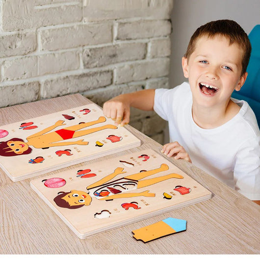 Child playing with a wooden puzzle on a table with a brick wall background