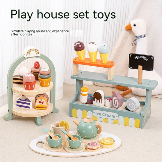 Wooden playhouse set toys with ice cream stand, tea set, and cake stand on a light background.