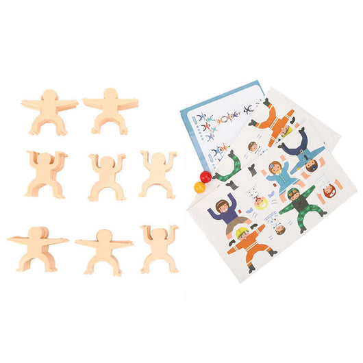 Set of wooden figurines and coloring book on a white background