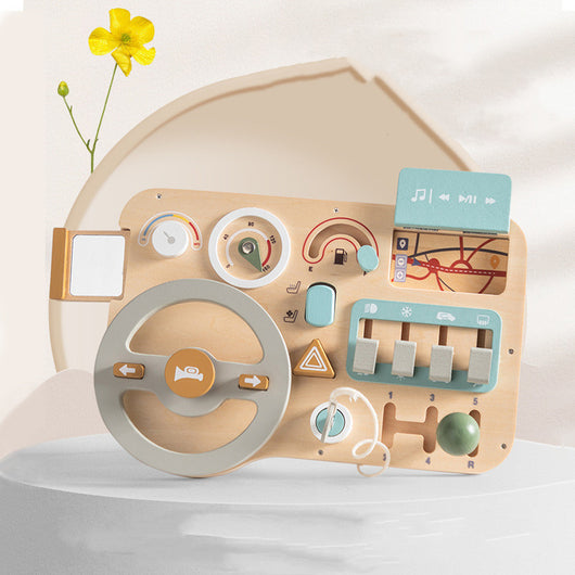 Wooden toy radio with various buttons and a steering wheel on a white background