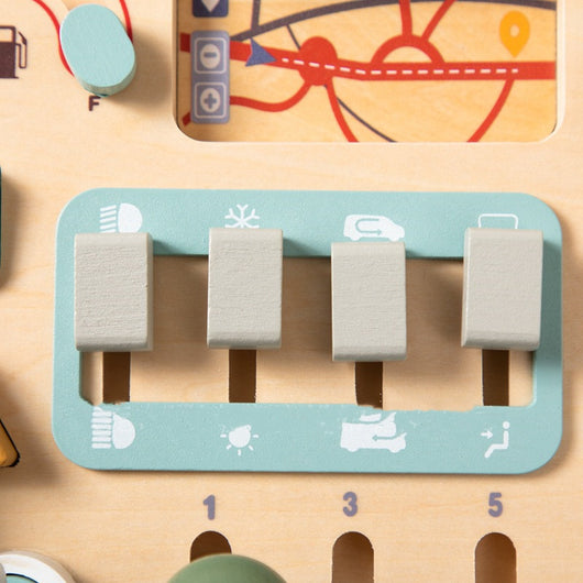 Wooden educational toy with buttons and a map background