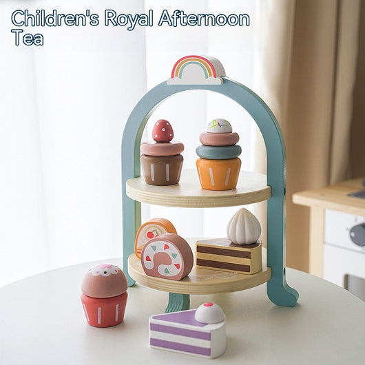 Children's toy tea set with pastel colors on a white surface