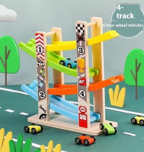 Toy wooden ramp with multiple tracks and cars on a green surface with trees and road markings.