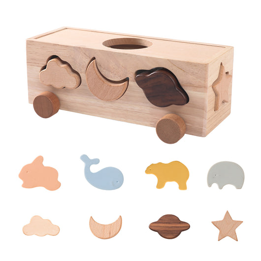 Wooden shape sorting toy with various wooden shapes on a white background