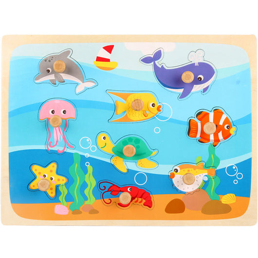 Wooden puzzle with colorful sea creatures on a blue background