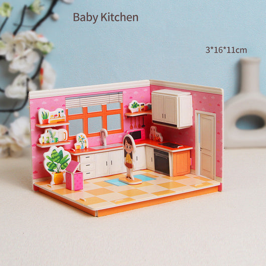 Miniature model of a baby kitchen set with pink walls and orange floor.