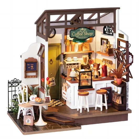 Model of a coffee shop with detailed interior and exterior on a white background