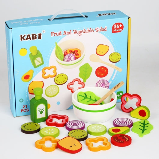KABI toy set with colorful fruit and vegetable shapes and a bowl on a white background